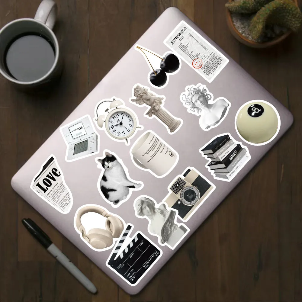 61 black and white waterproof PVC stickers for laptop and phone decoration.