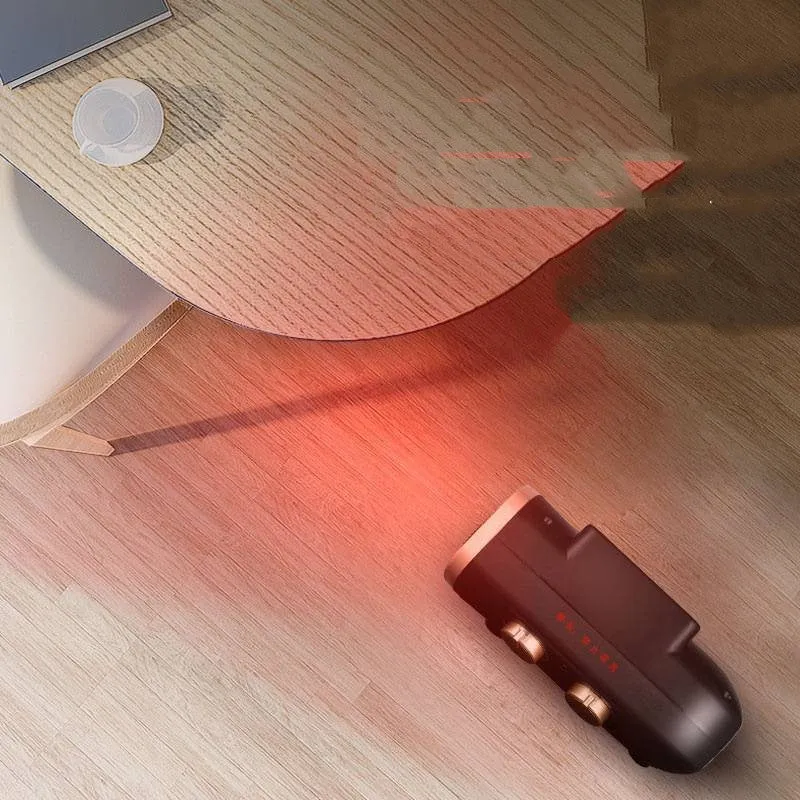 White and black gold portable electric ceramic fan heater with control dials on top.