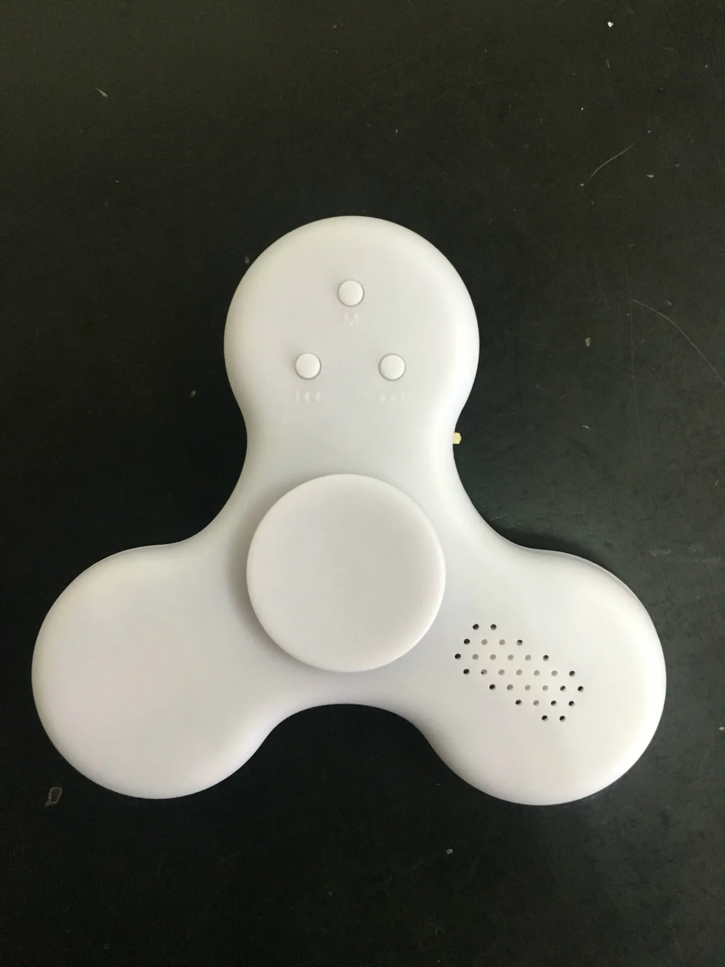 Bluetooth speaker fidget spinner in ABS plastic with 80mm diameter, shown in blue colour option