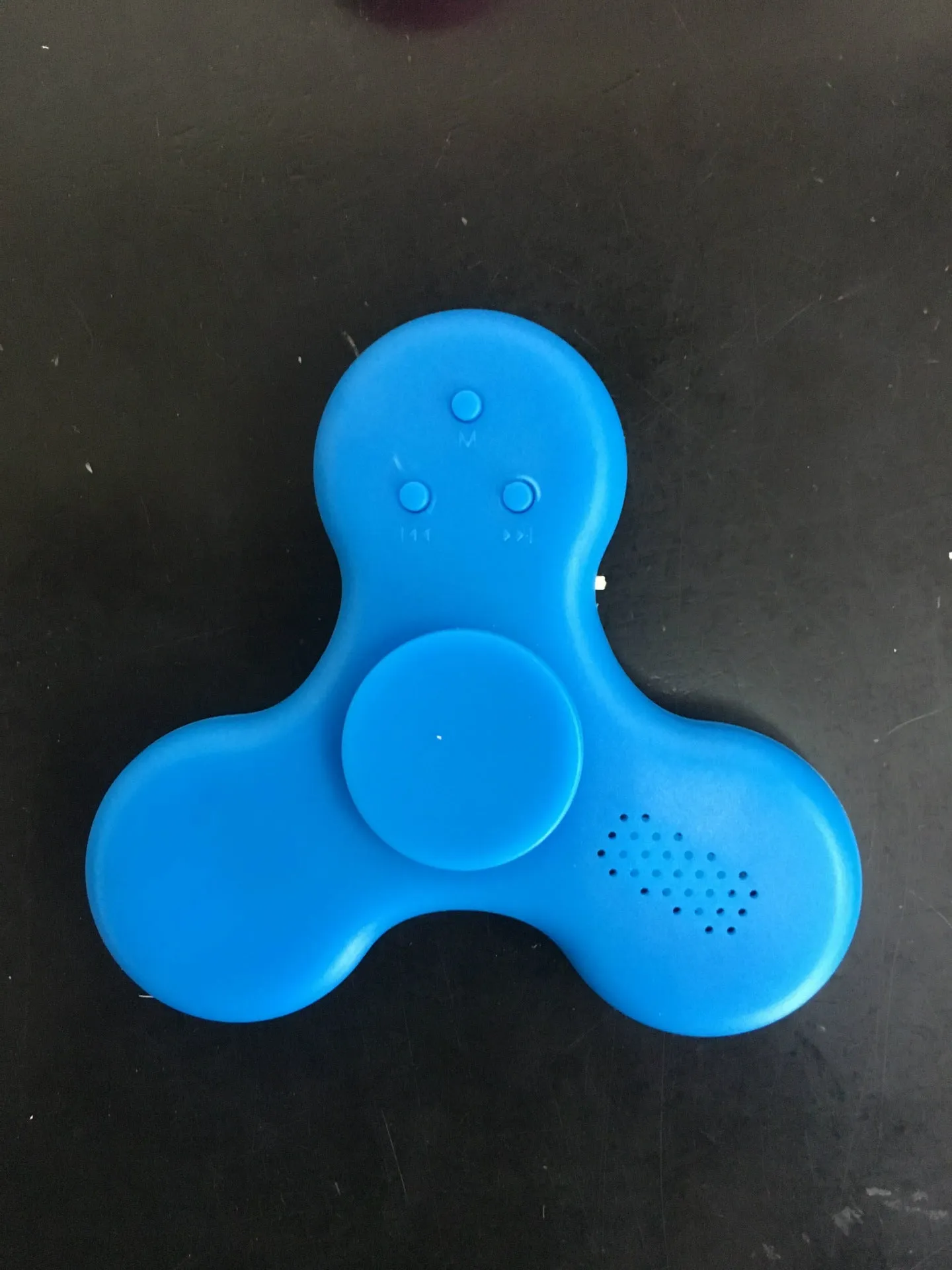 Bluetooth speaker fidget spinner in ABS plastic with 80mm diameter, shown in blue colour option