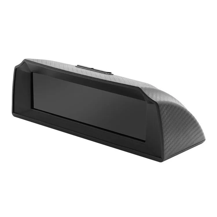 GPS GO 2 car head-up display unit with carbon fibre body on a dashboard, showing speed and angle data on a colour LCD screen.