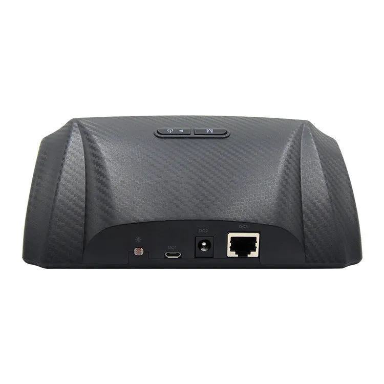 GPS GO 2 car head-up display unit with carbon fibre body on a dashboard, showing speed and angle data on a colour LCD screen.