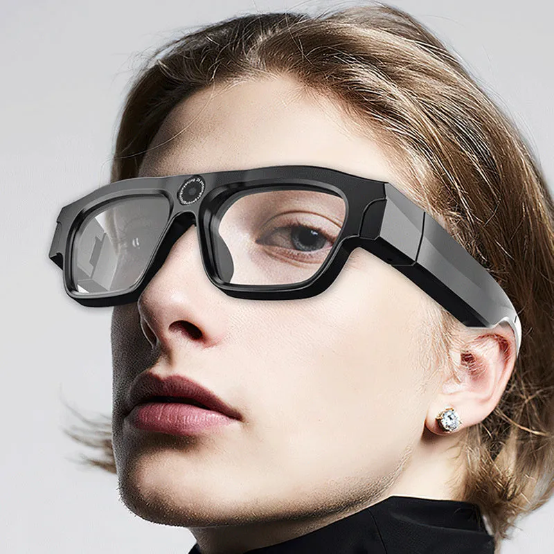 Black head-mounted smart glasses with a video recorder, showing touch controls on the frame.