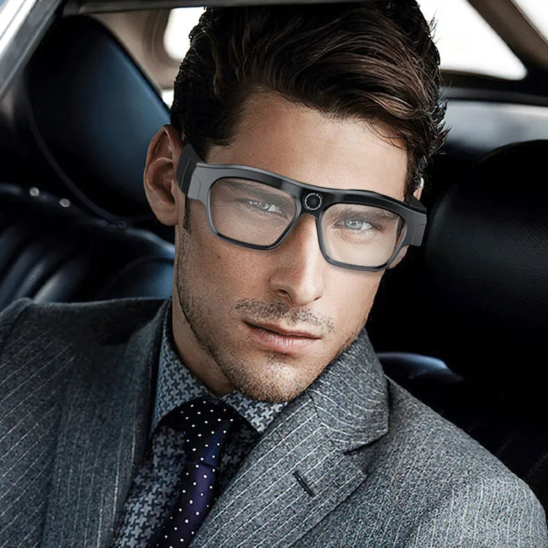 Black head-mounted smart glasses with a video recorder, showing touch controls on the frame.