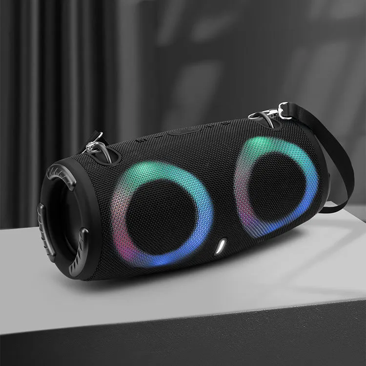 War Drum portable Bluetooth speaker with coloured LED lights in a black finish, showing carrying strap and control buttons.