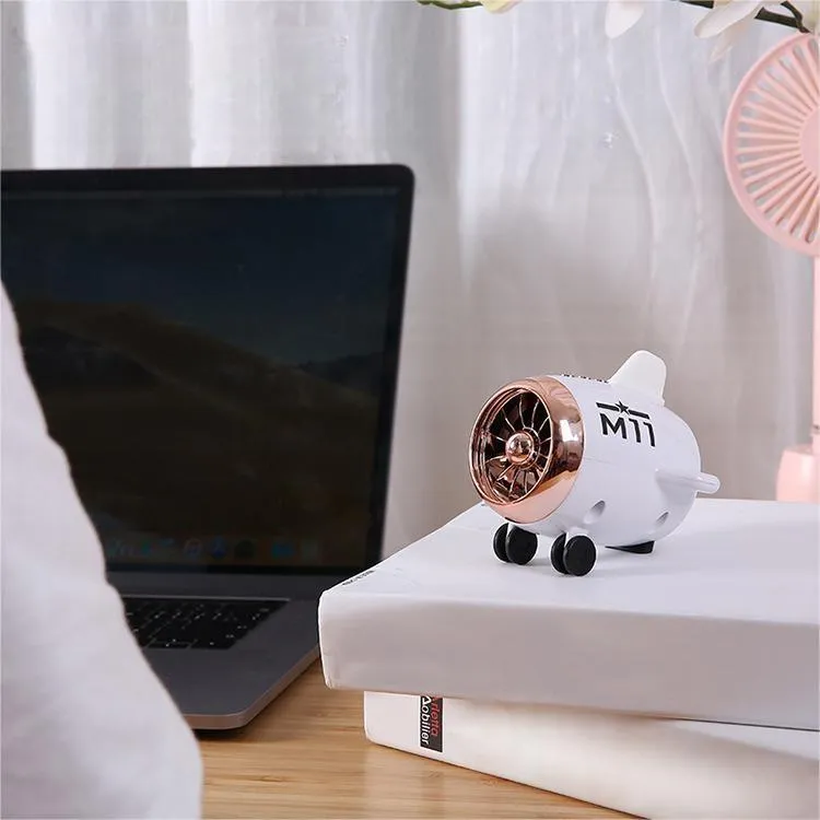 Mini Bluetooth wireless speaker in multiple colour options showing compact size