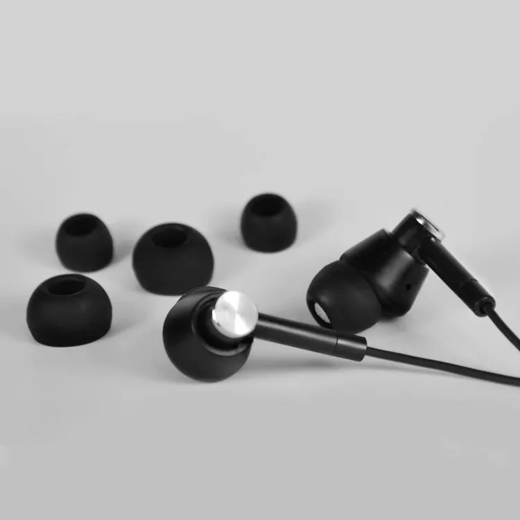Black and white wired in-ear earphones with subwoofer for computers and mobile phones
