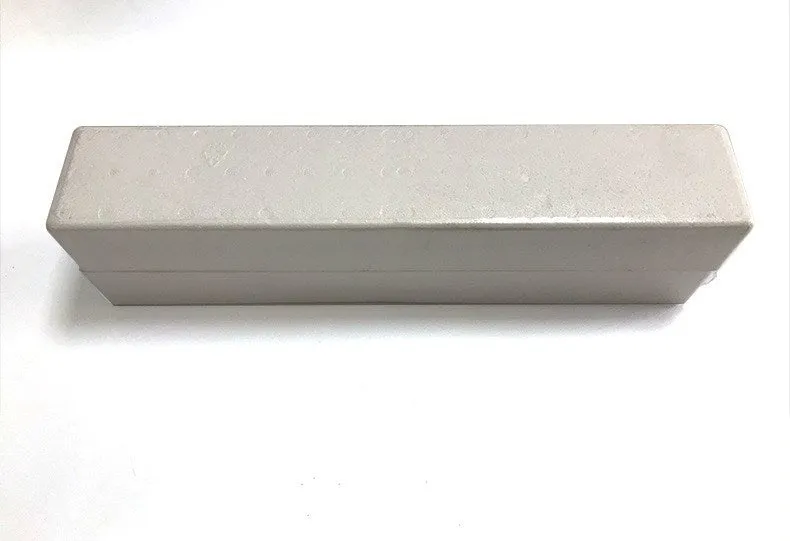 BS-41A black wall-mounted plastic Bluetooth speaker with remote control on a white wall.