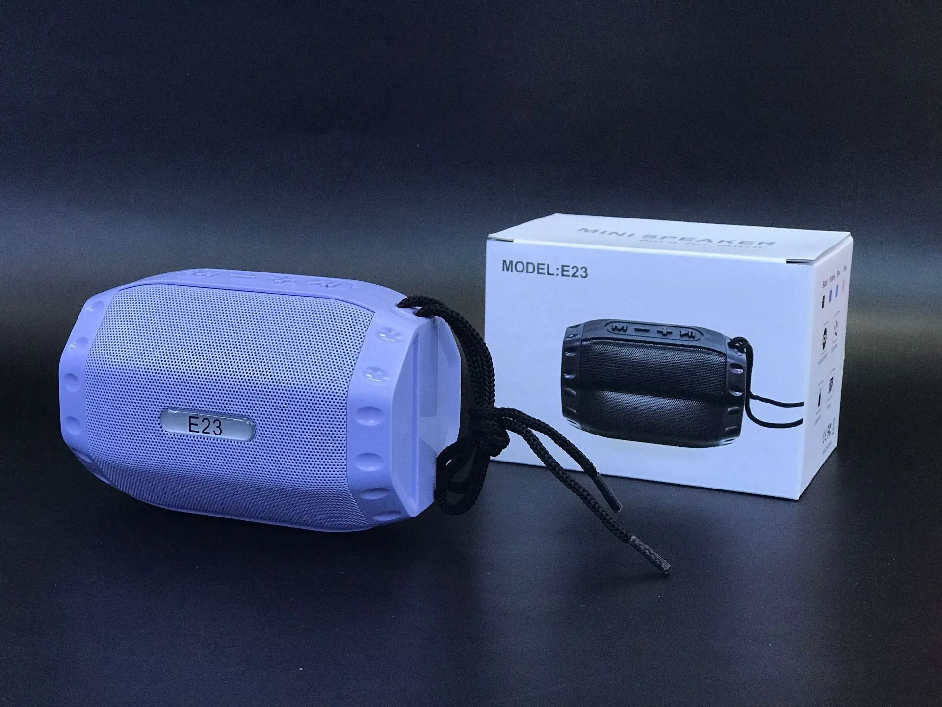 Small portable Bluetooth speaker with USB connectivity in black, blue, pink, or purple colour options
