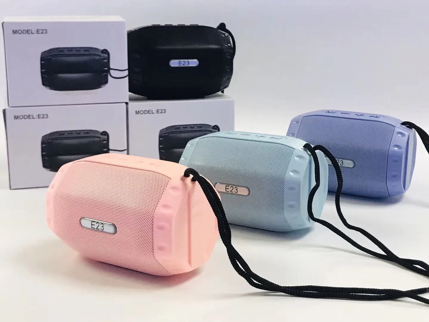 Small portable Bluetooth speaker with USB connectivity in black, blue, pink, or purple colour options