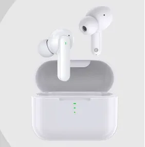 Black and white wireless in-ear Bluetooth headphones with a magnetic charging case on a table.