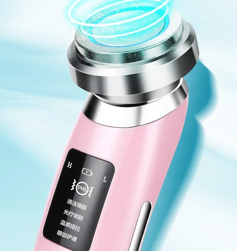 Pink portable skin rejuvenation and facial cleansing beauty instrument showing its compact size.