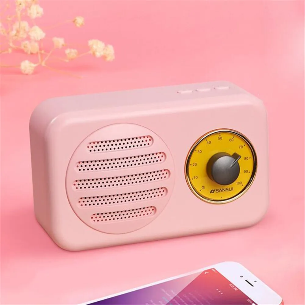 Portable Bluetooth mini speaker in vintage wood colour finish with micro USB cable.