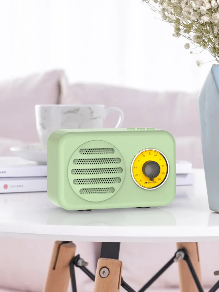 Portable Bluetooth mini speaker in vintage wood colour finish with micro USB cable.