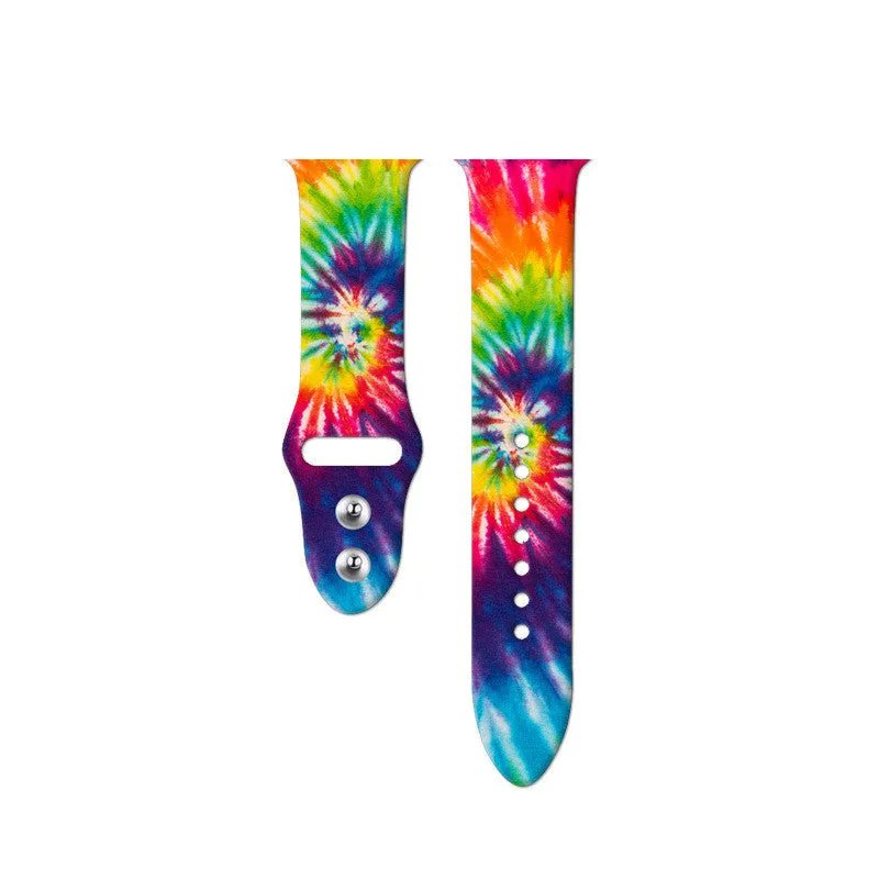 Silicone Apple Watch strap showing multiple tie-dye and custom colour pattern options