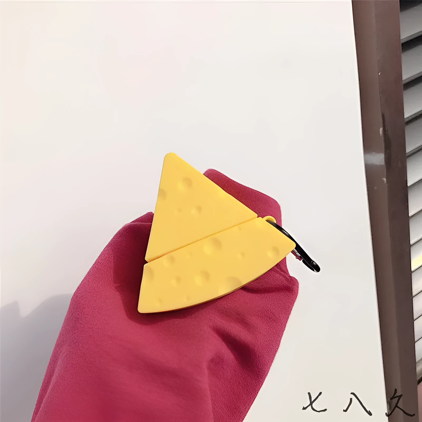 Yellow silicone protective cover for Apple AirPods 1/2 and AirPods Pro 3 charging case.