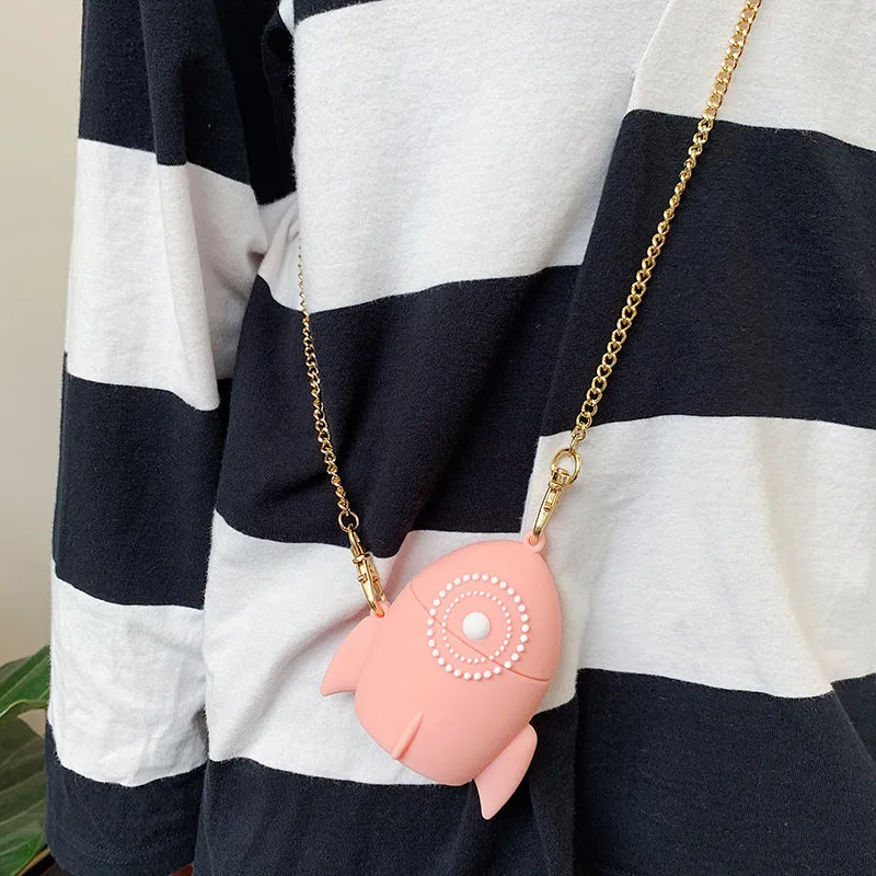 Pink silicone protective case on an AirPods wireless charging case.