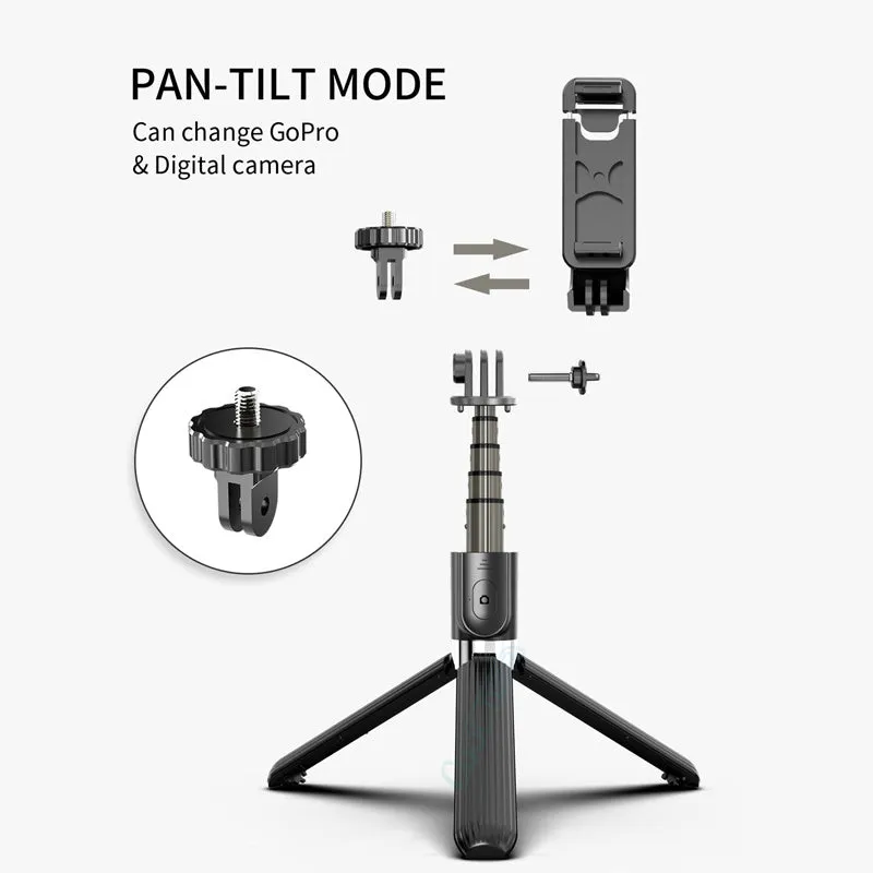 Black aluminium selfie stick with tripod base extended to mid-length next to an iPhone.