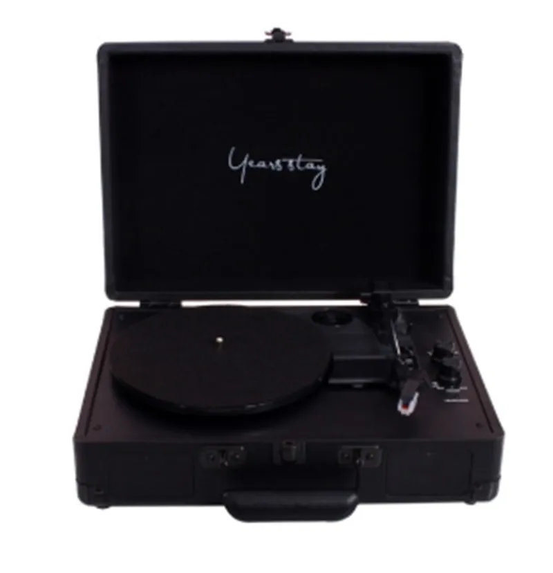 Portable Bluetooth vinyl turntable in a leather carrying case shown in multiple colour options