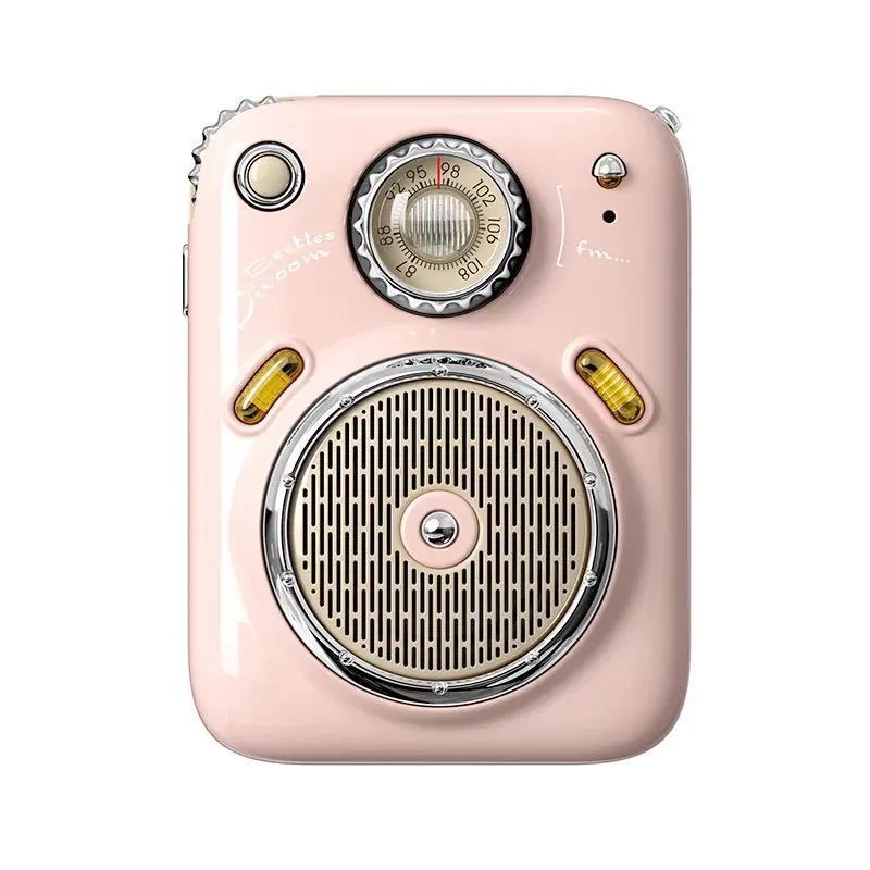 Compact green FM Four in One Smart Bluetooth Speaker with integrated radio on a table.