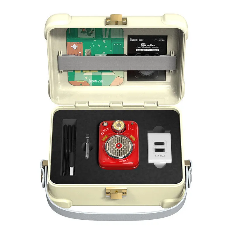 Compact green FM Four in One Smart Bluetooth Speaker with integrated radio on a table.