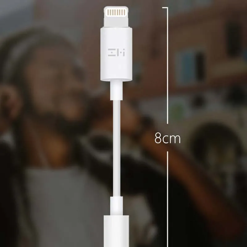 White lightning to 3.5mm audio adapter cable for iPhones showing three variant connectors
