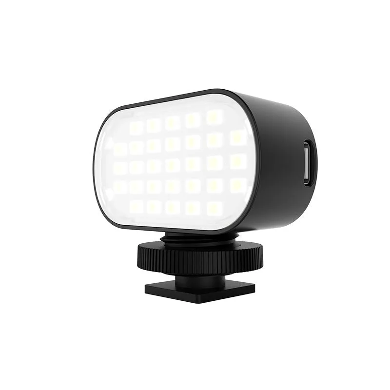 ST-30 black mobile phone fill light with colour palettes and cold shoe mount for photography