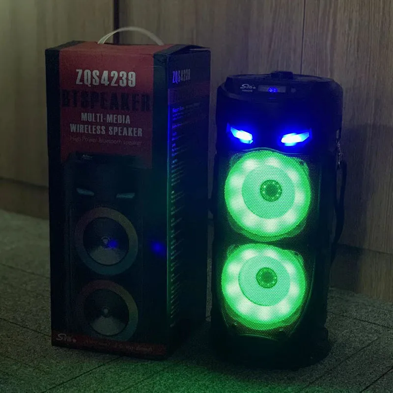 Black portable Bluetooth speaker with dual horn cannon design and compact dimensions