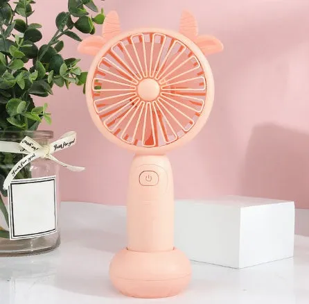 A handheld mini fan with plastic blades, shown in blue, green, pink, and yellow colour options.