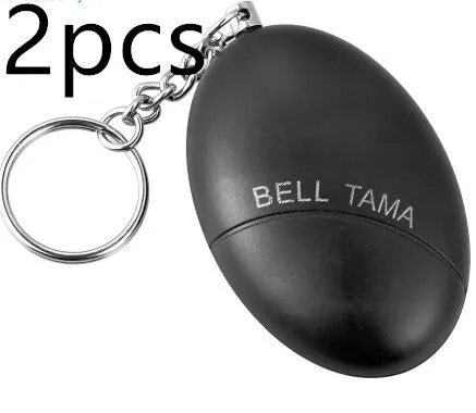 Compact keychain personal alarm in colours like black, blue, or pink showing the pull-out activation tab.