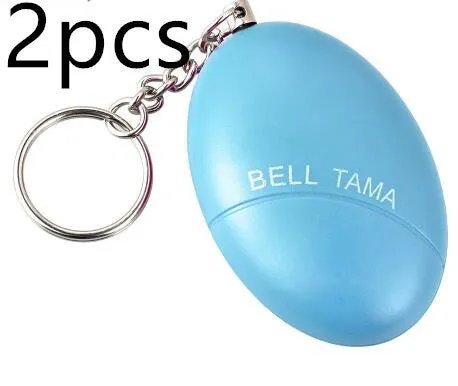 Compact keychain personal alarm in colours like black, blue, or pink showing the pull-out activation tab.
