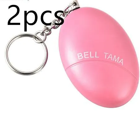Compact keychain personal alarm in colours like black, blue, or pink showing the pull-out activation tab.