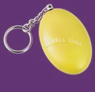 Compact keychain personal alarm in colours like black, blue, or pink showing the pull-out activation tab.