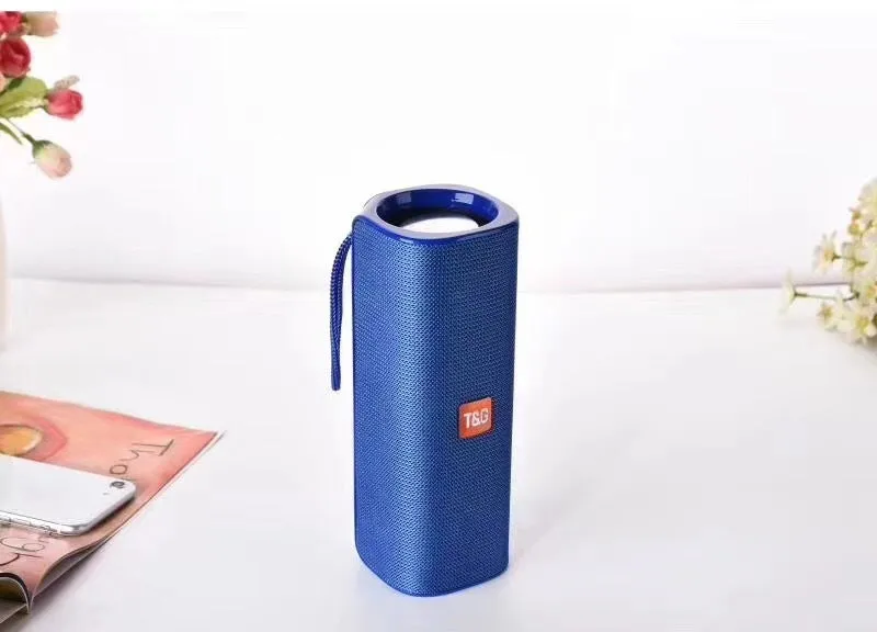 Cloth-covered portable wireless Bluetooth speaker with multiple colour options and control buttons