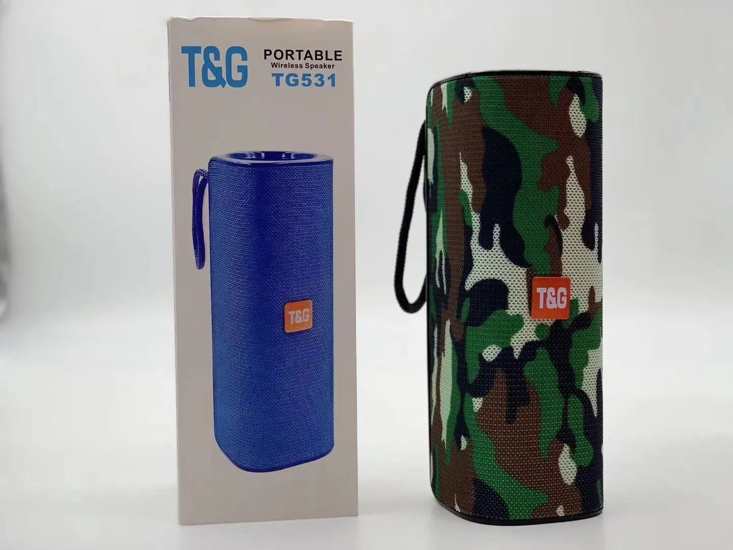 Cloth-covered portable wireless Bluetooth speaker with multiple colour options and control buttons