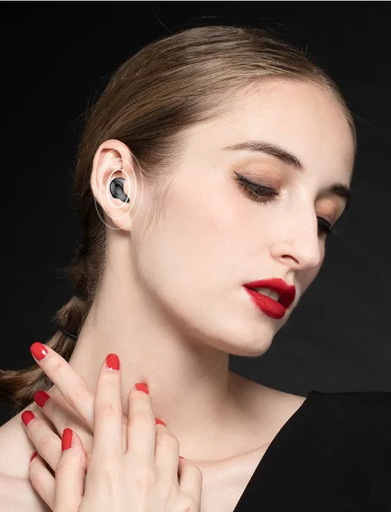 Black and white wireless Bluetooth in-ear headphones with compact charging case