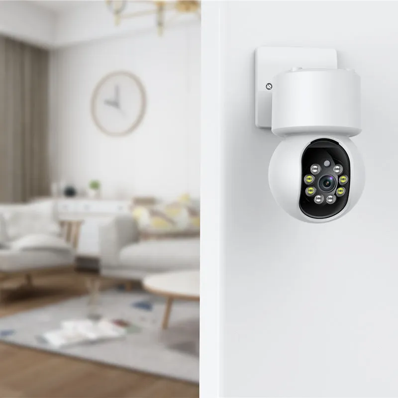White wireless indoor security camera with 360-degree rotation capability on stand