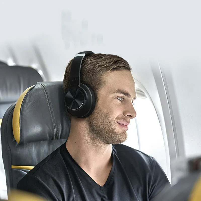 Cold black Bluetooth wireless over-ear headphones with active noise cancellation and built-in microphone