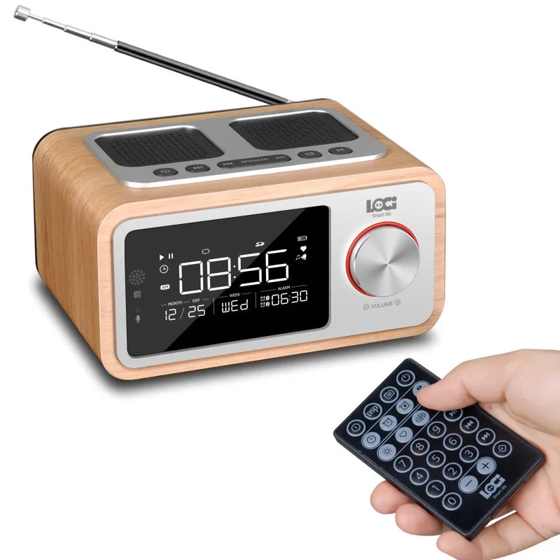Wooden Bluetooth speaker alarm clock radio in golden oil colour on a bedside table.