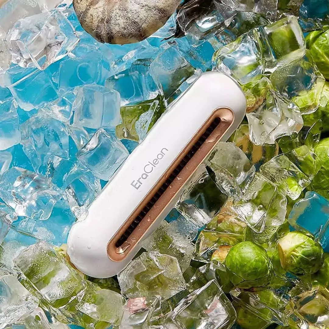 Rose gold USB car air purifier with activated carbon filter for deodorising and sterilising.