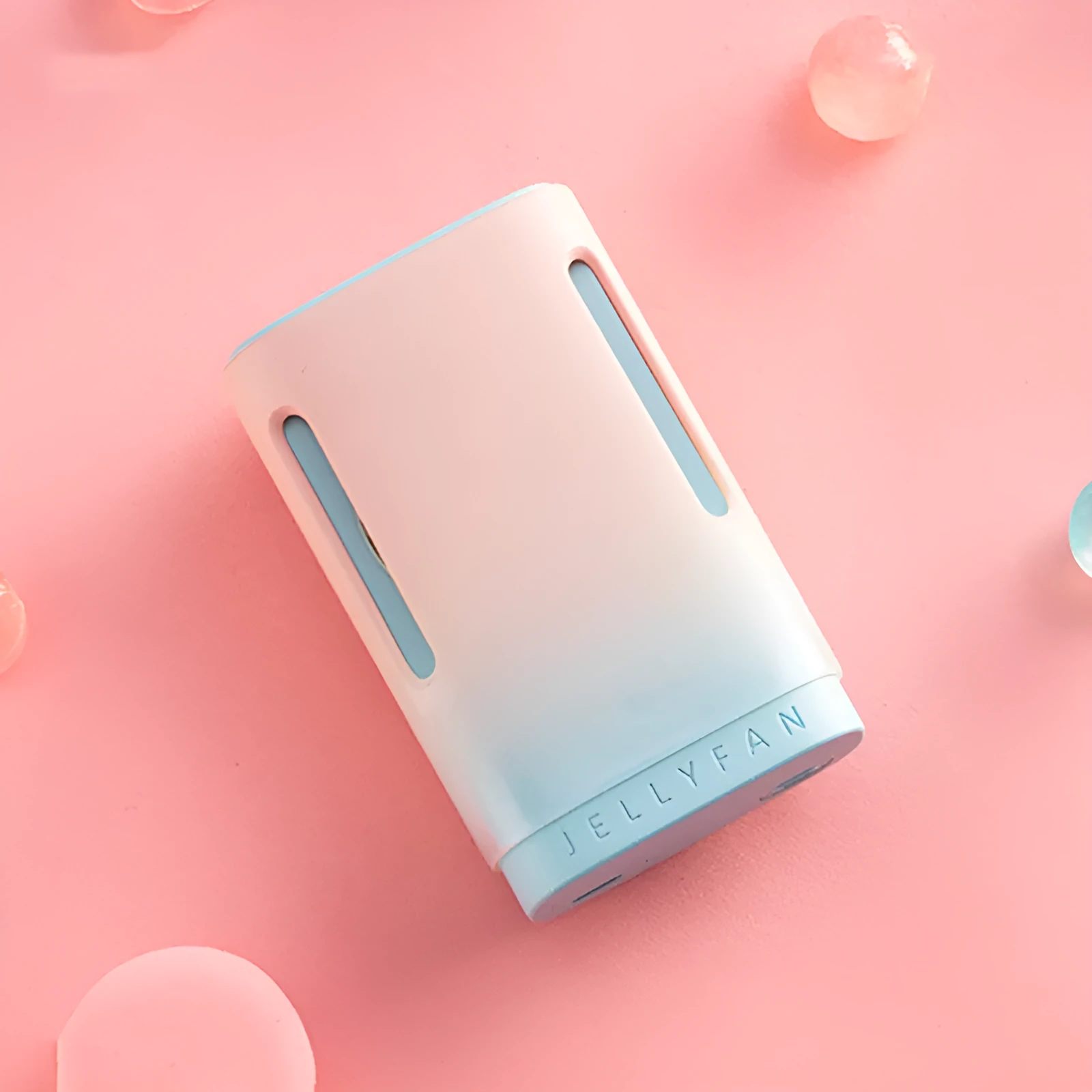 Jelly USB hanging neck fan in mint peach colour, compact and portable for hands-free cooling