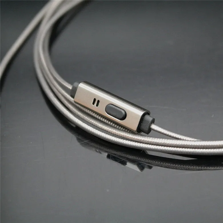Titanium grey metal in-ear earphones with a detachable TPE cable and aluminium foil shielding.