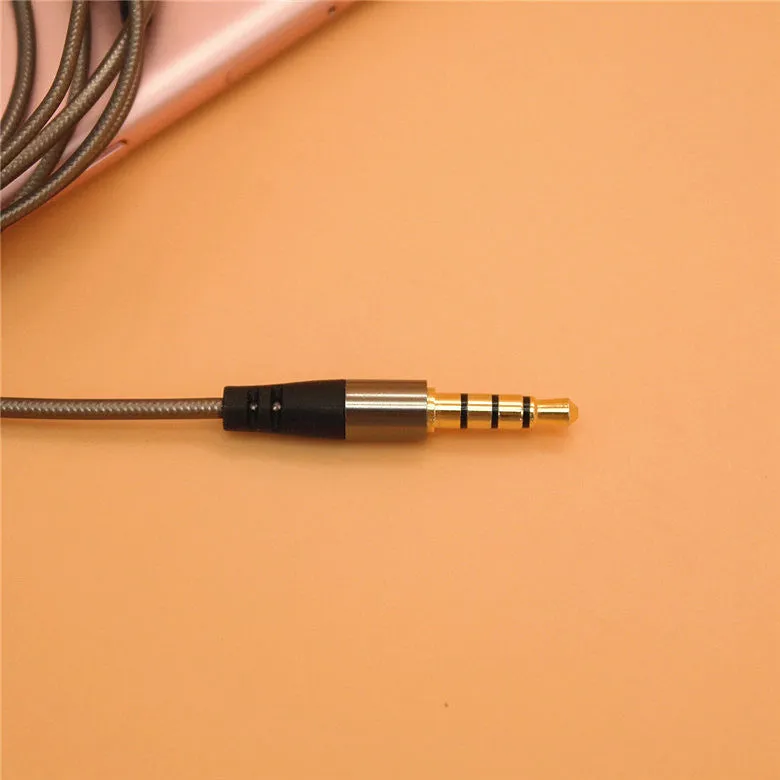 Titanium grey metal in-ear earphones with a detachable TPE cable and aluminium foil shielding.