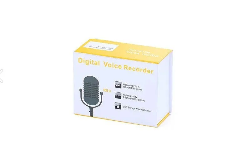Small black or gold portable digital voice recorder with USB cable on a desk.