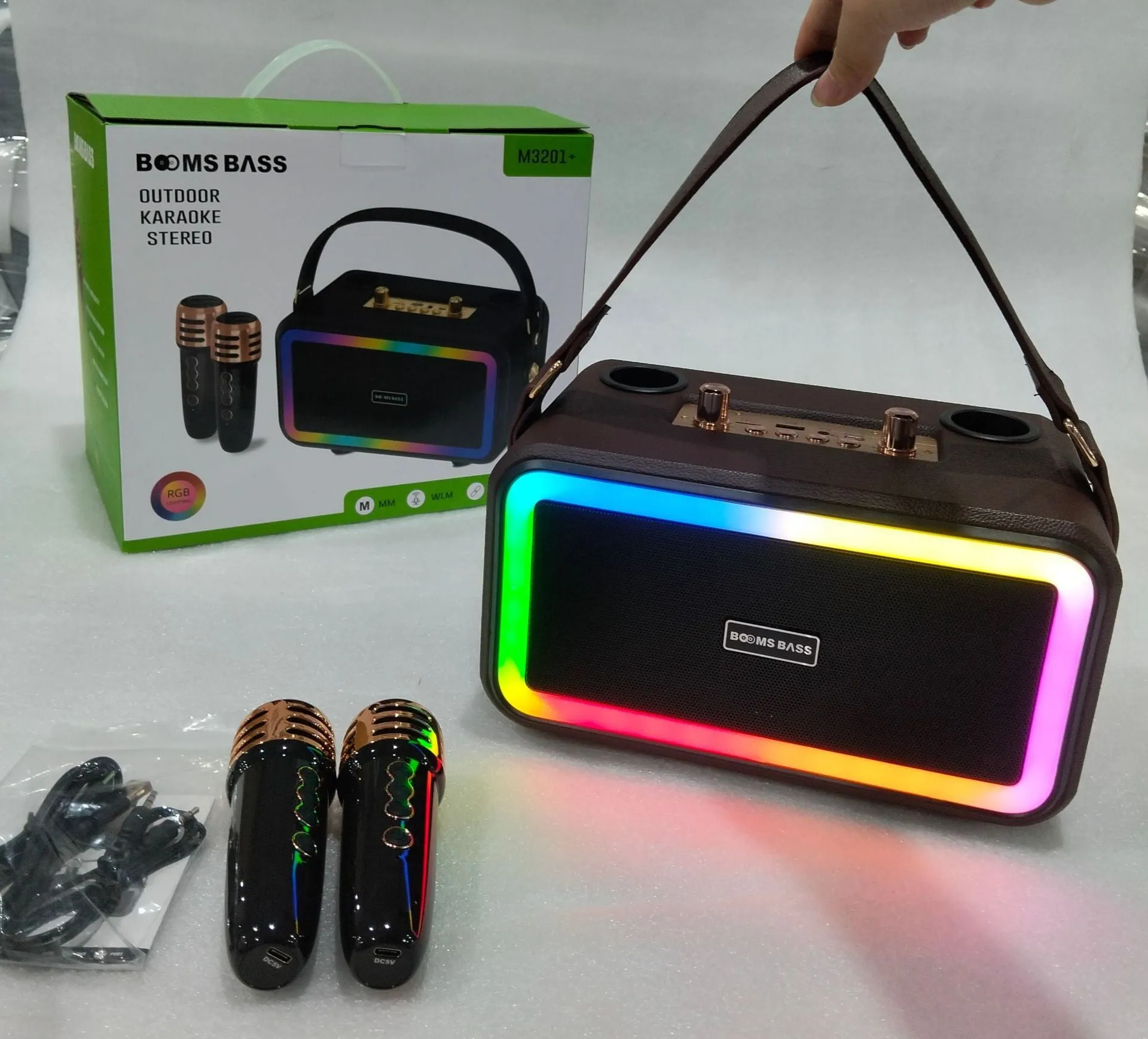 M3201 portable Bluetooth speaker in black, dark brown, or orange red with microphones and cables