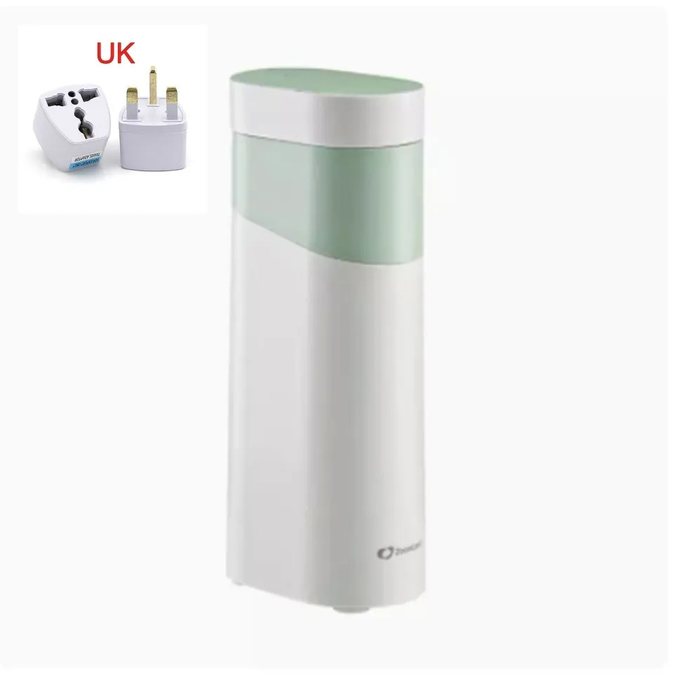 Small black instant water dispenser with digital display on a desktop.