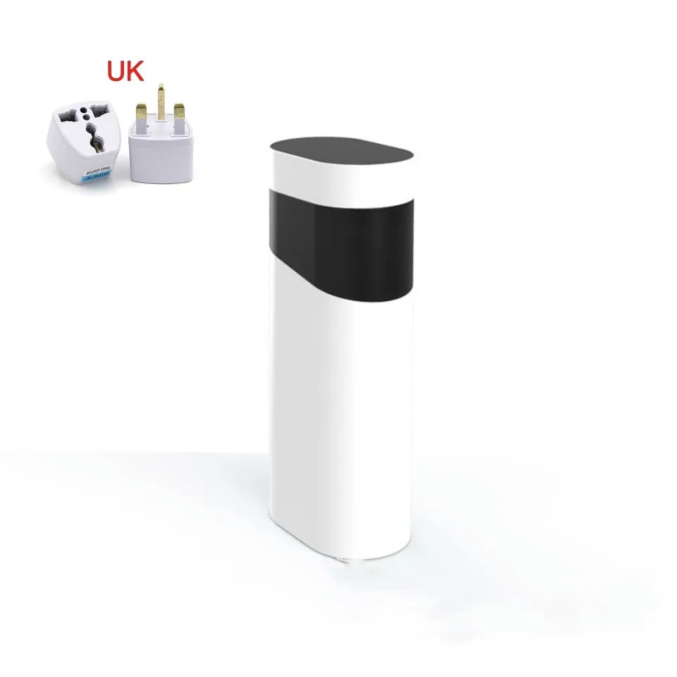 Small black instant water dispenser with digital display on a desktop.