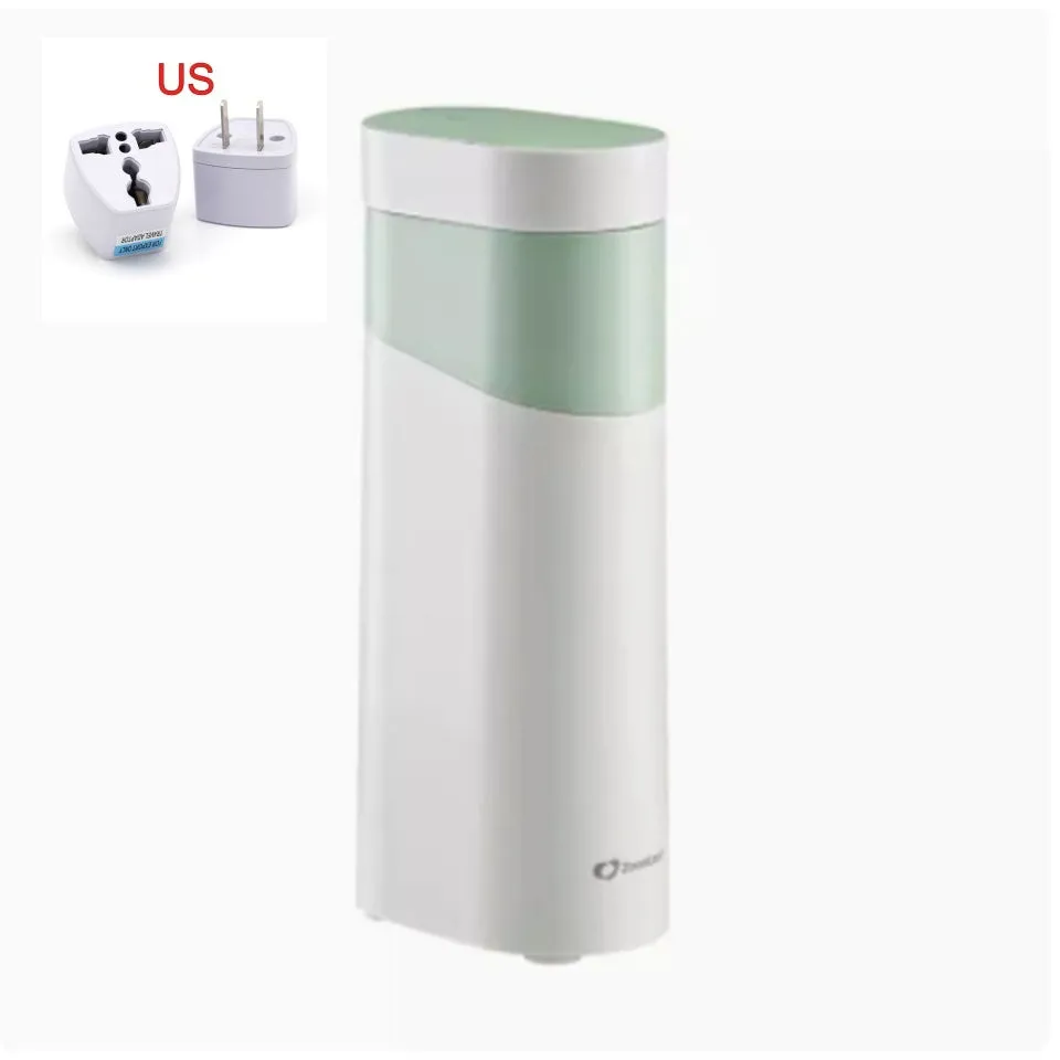 Small black instant water dispenser with digital display on a desktop.