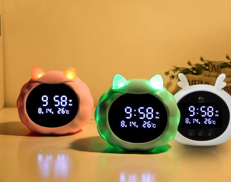 Smart alarm clock with voice control, human body sensor, and luminous dial in silicone white deer style.