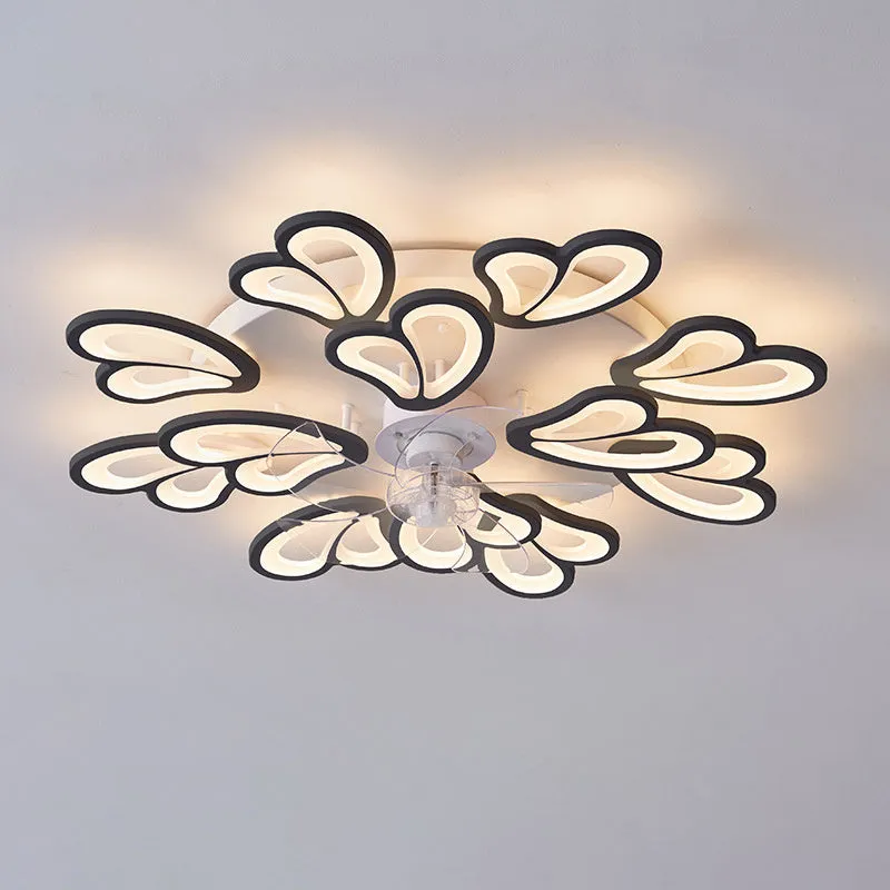 Modern white ceiling fan light with six-blade design and integrated light fitting on a room ceiling.